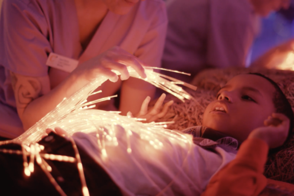 child in a hospice sensory room